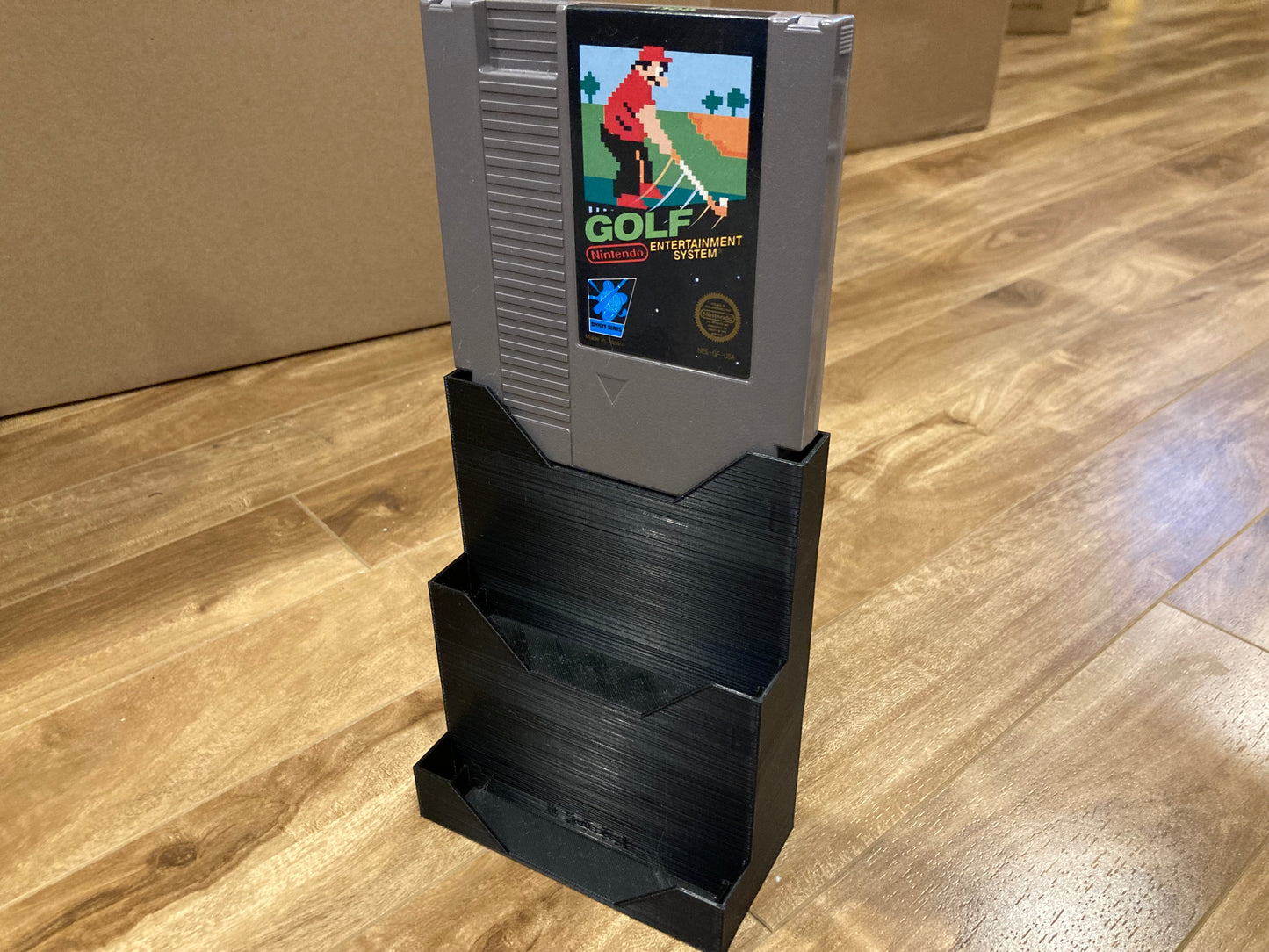 NES game display - Holds 3 games - Black color - Perfect condition