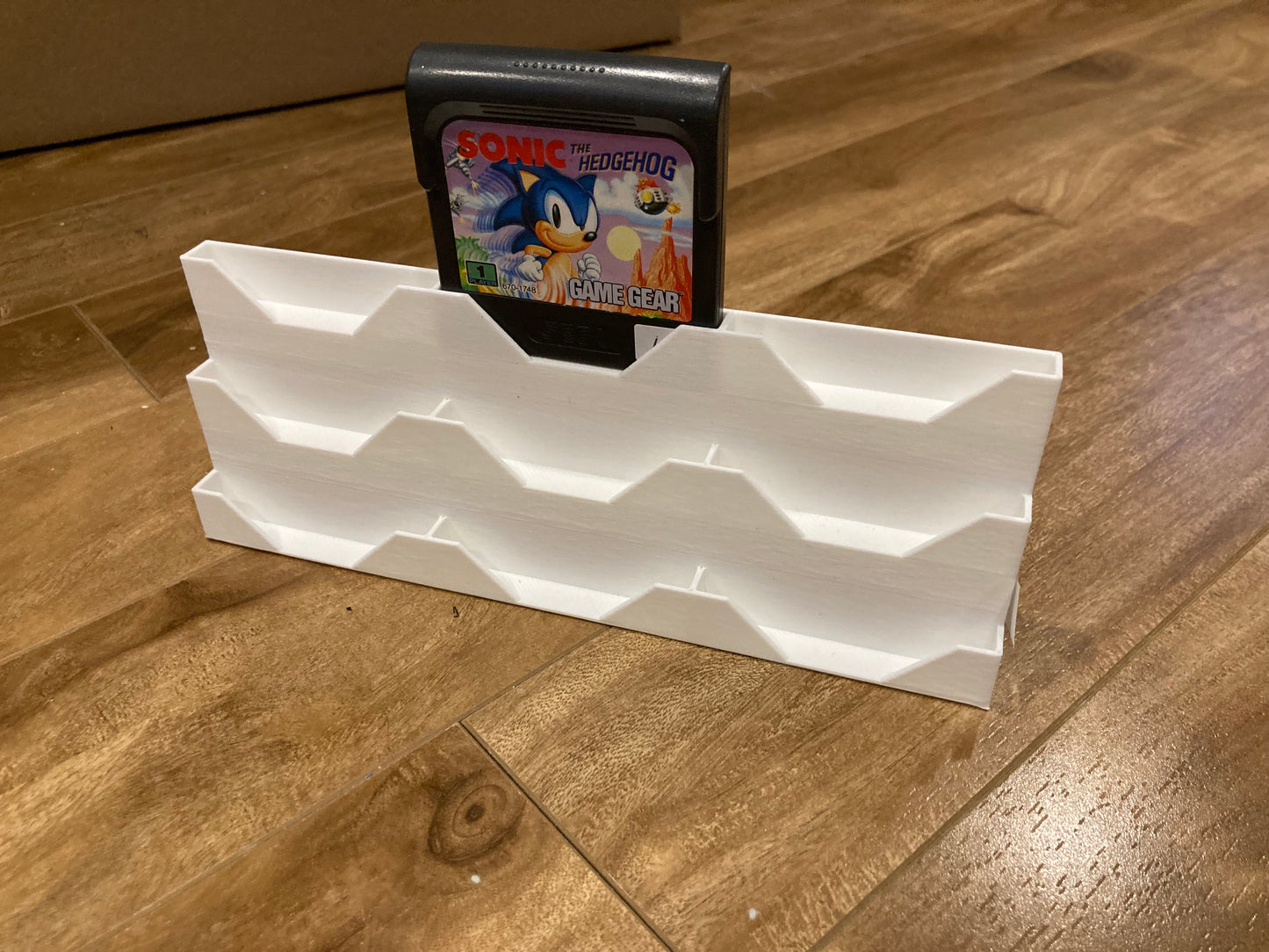 Sega Game Gear game display - Holds 9 games - White color - Perfect condition