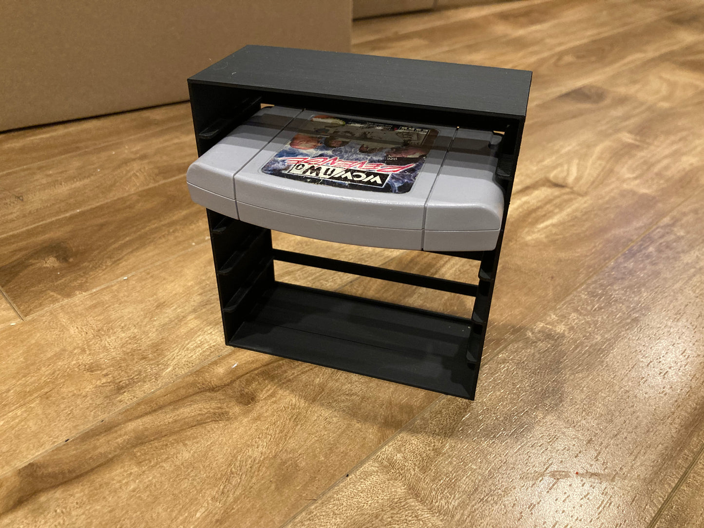 N64 rack display - Holds 6 games - Black color - Perfect condition