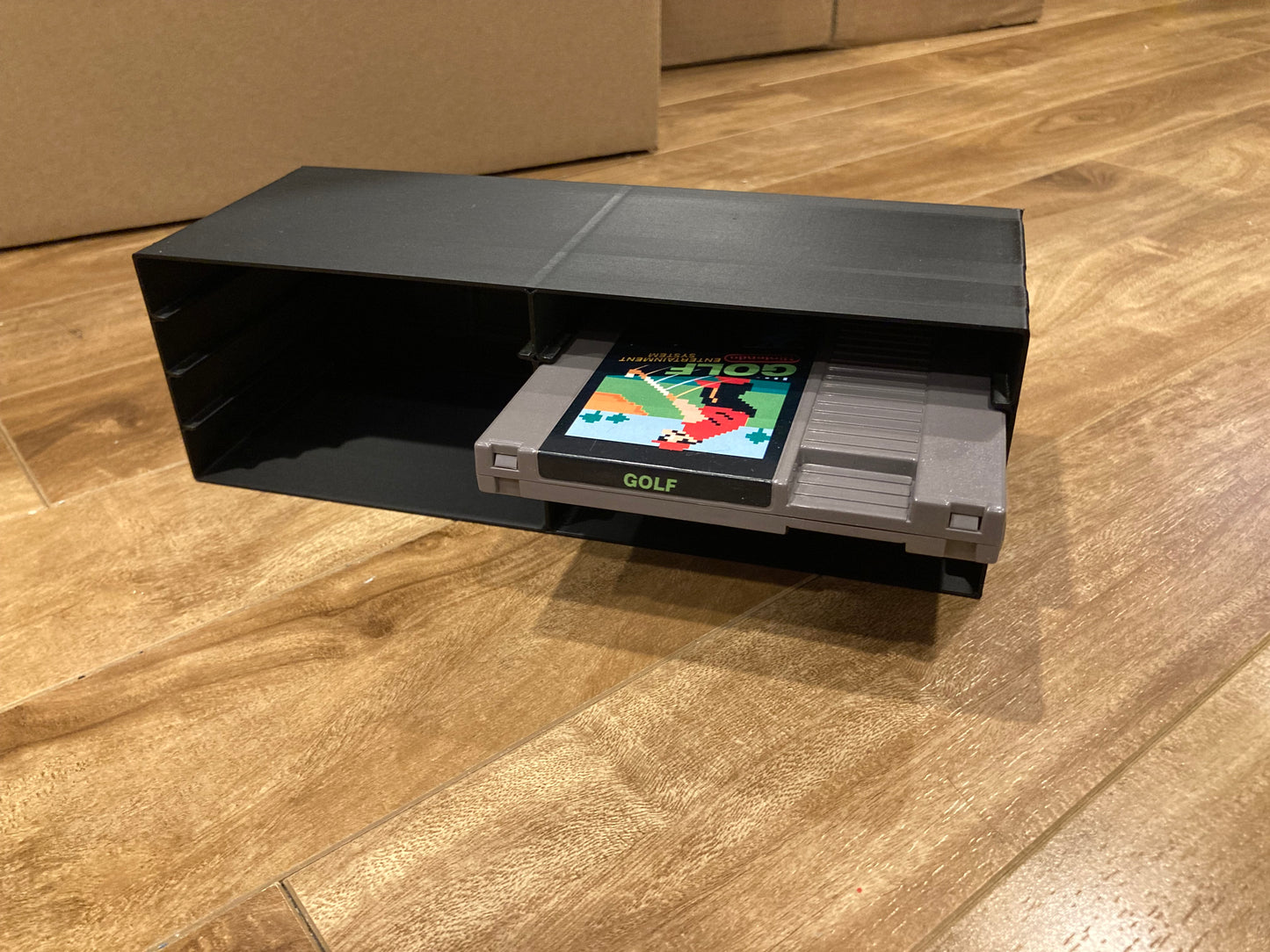 NES rack display - Holds 8 games - Black color - Perfect condition