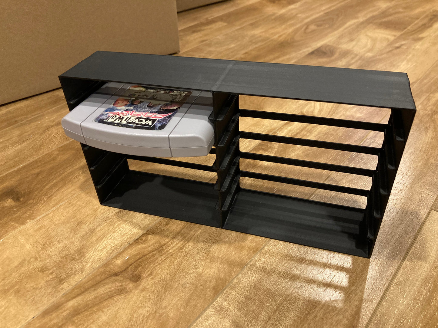 N64 rack display - Holds 12 games - Black color - Perfect condition
