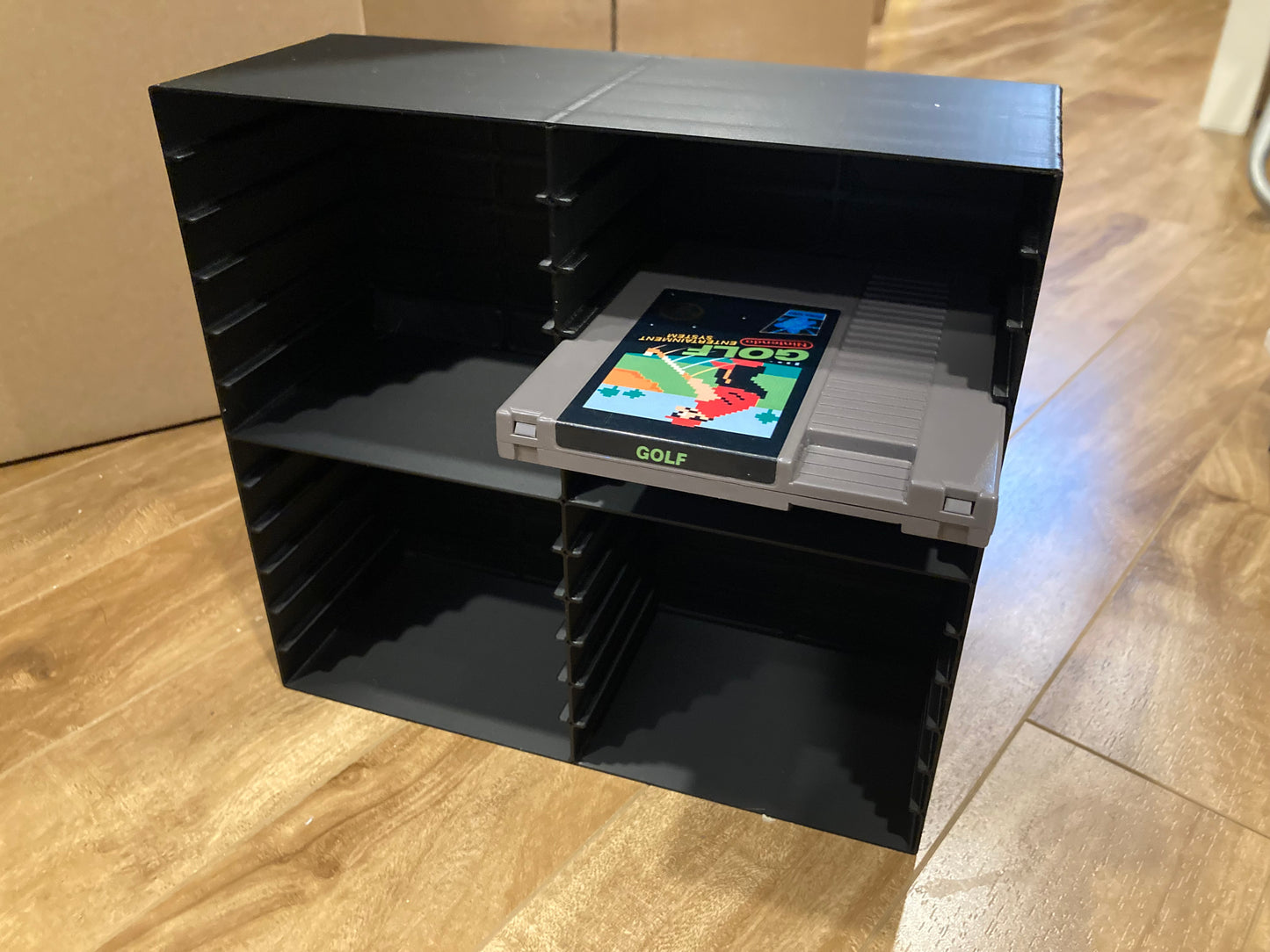 NES rack display - Holds 24 games - Black color - Perfect condition