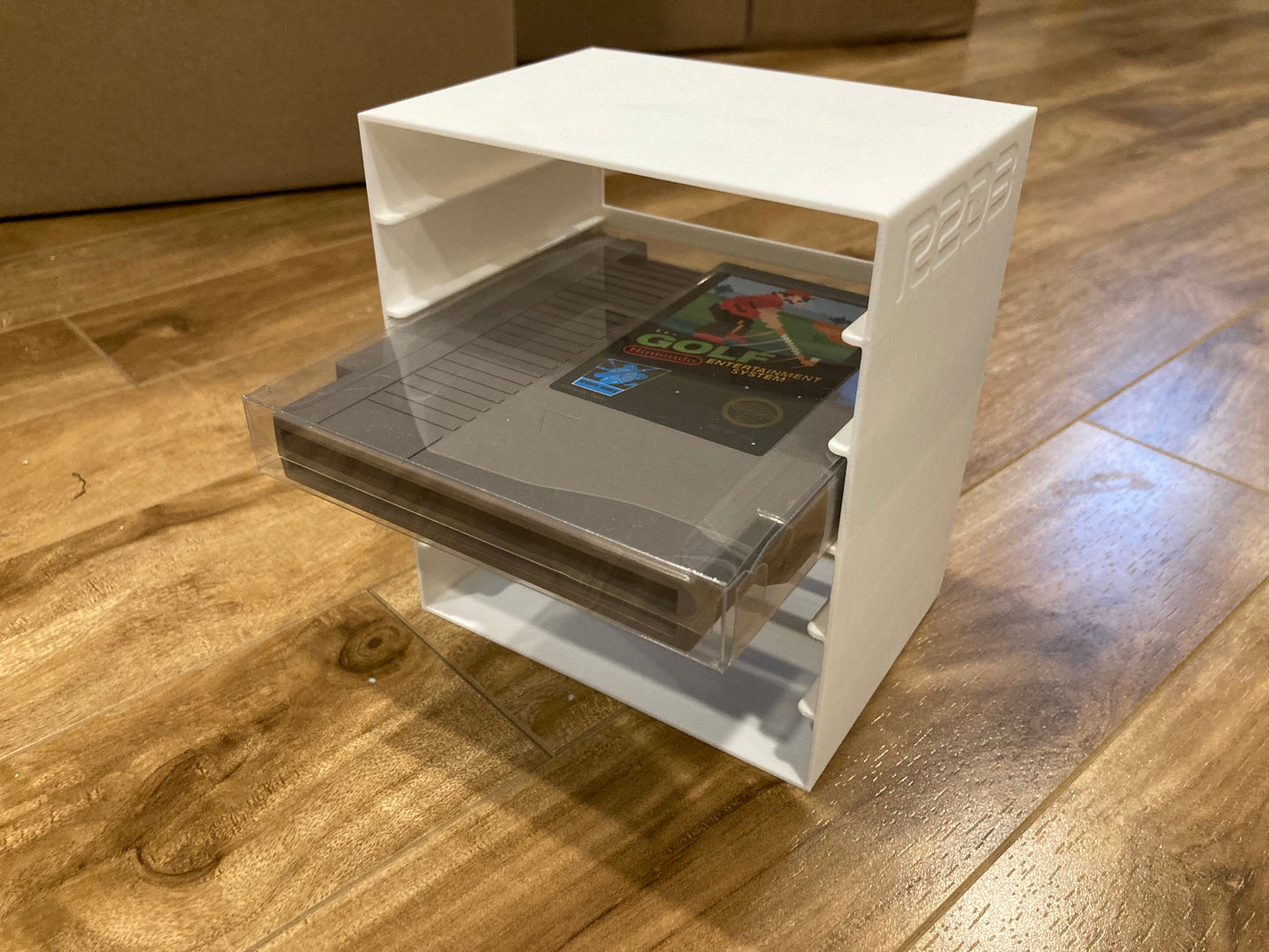 NES rack display for games in plastic PET protectors - Holds 6 games - White color - Perfect condition