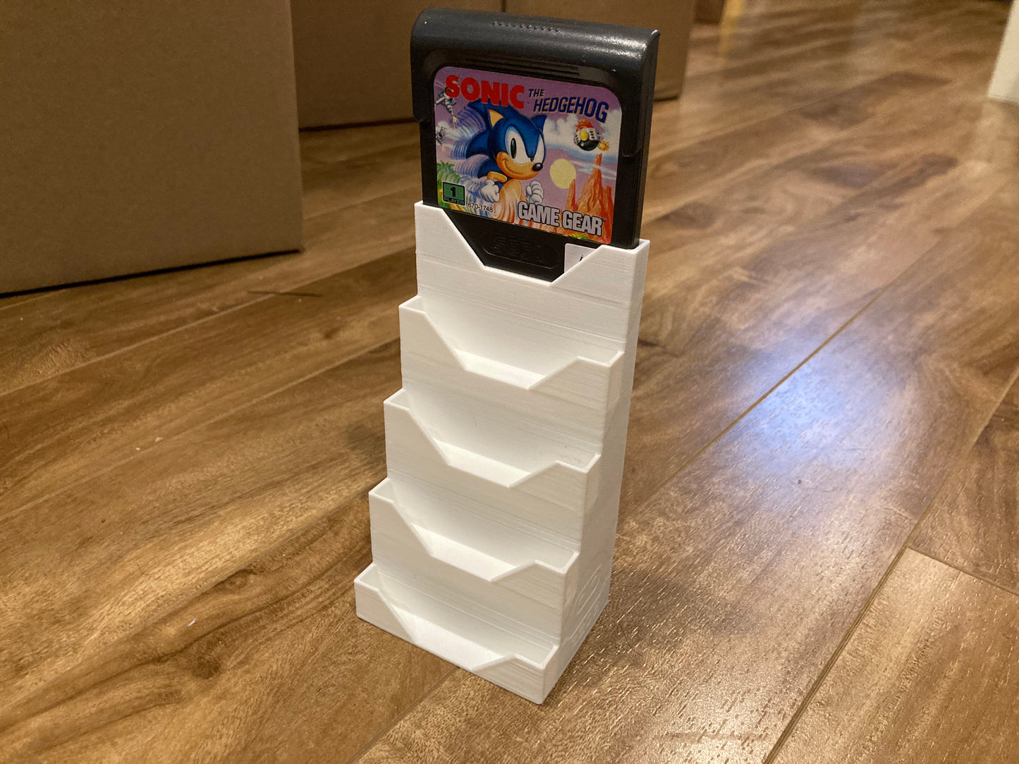 Sega Game Gear game display - Holds 5 games - White color - Perfect condition