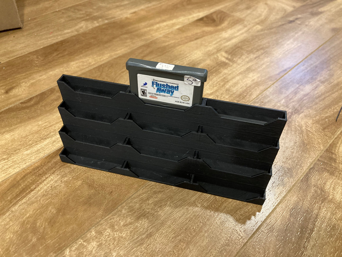 Game boy Advance game display - Holds 12 games - Black color - Perfect condition