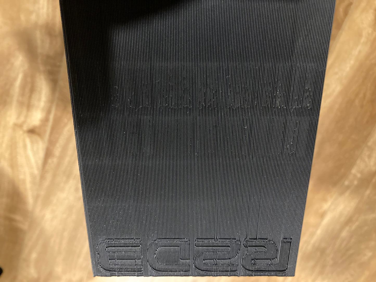 NES rack display - Holds 30 games NOT SLEEVED - Black color - Open back - Little rough surface on one side