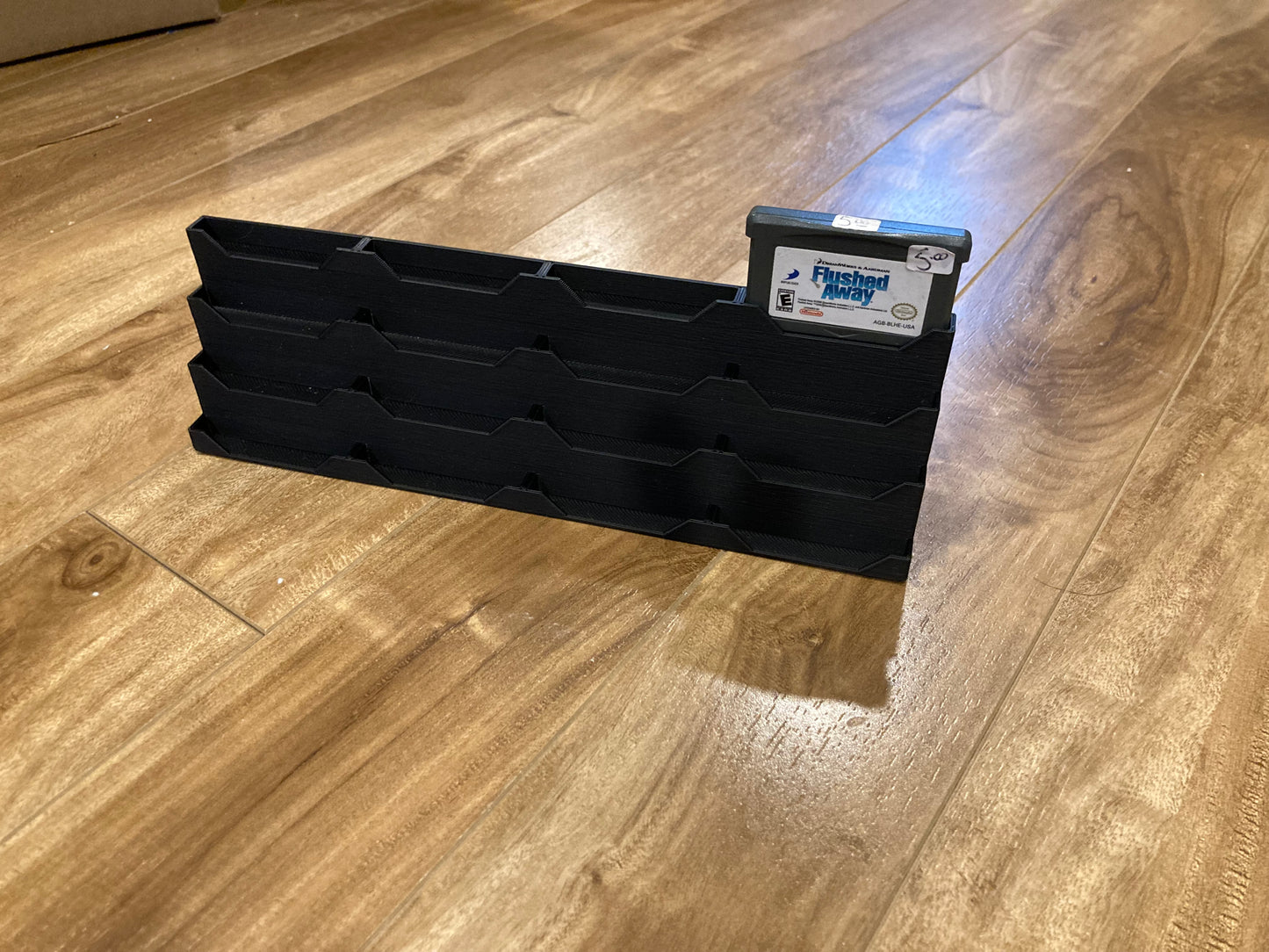 Game boy Advance game display - Holds 16 games - Black color - Perfect condition