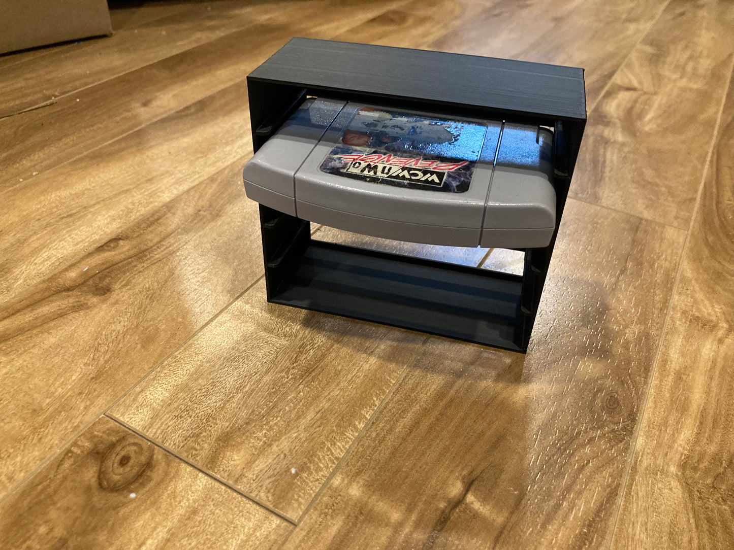 N64 rack display - Holds 5 games - Black color - Perfect condition