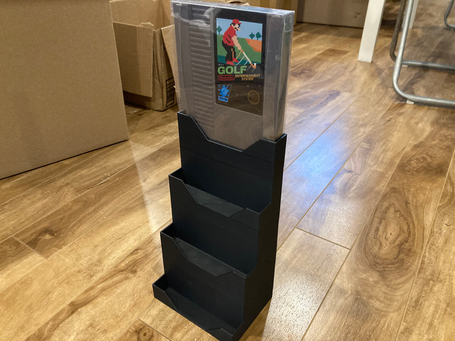 NES game display for games in PET protectors - Holds 4 games - Black color - Perfect condition