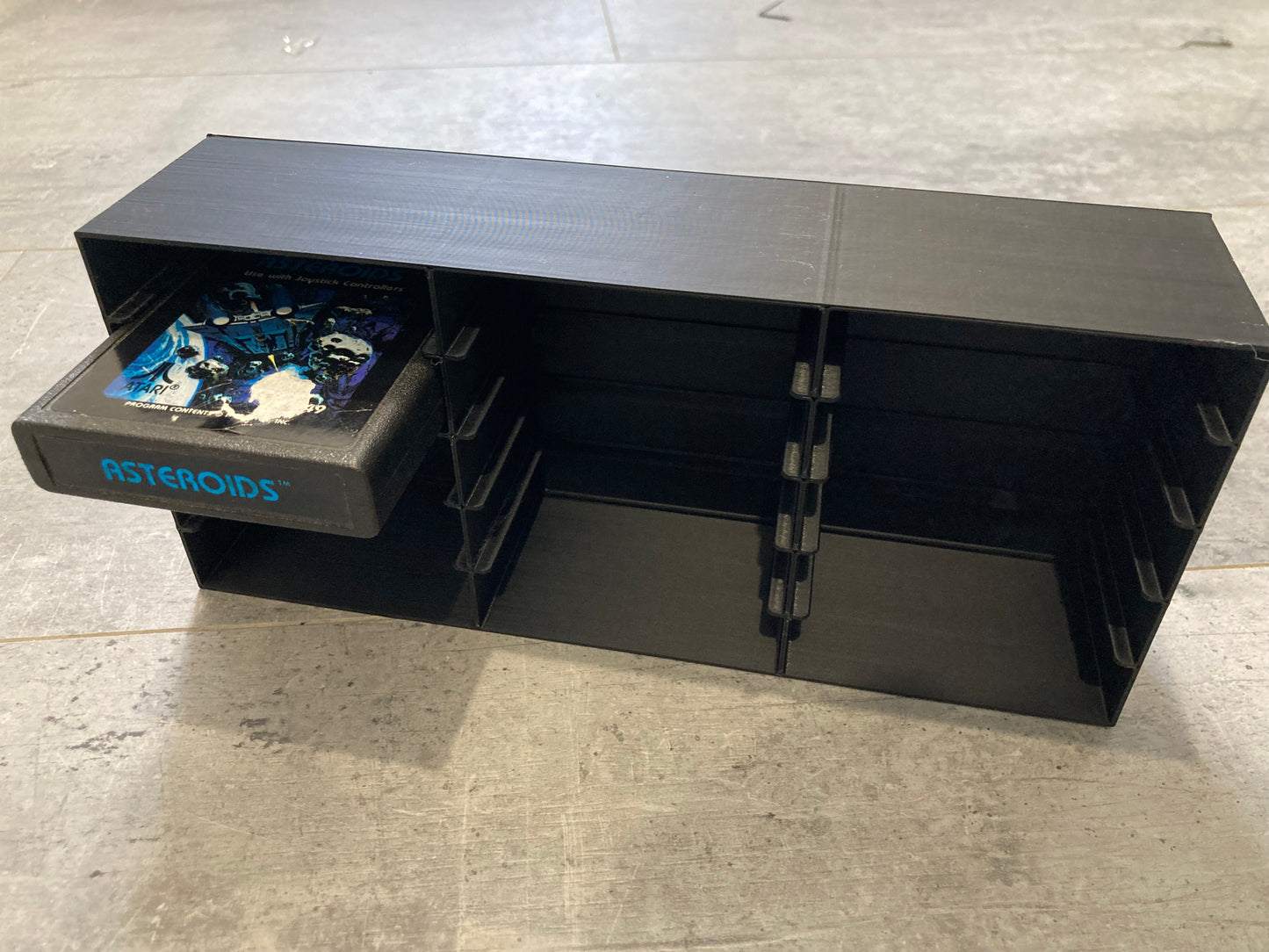 Atari 2600 rack display (Holds 15 games) Perfect condition