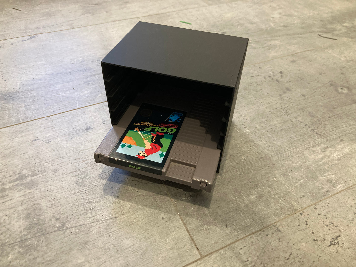 Display for 6 NES games, closed back