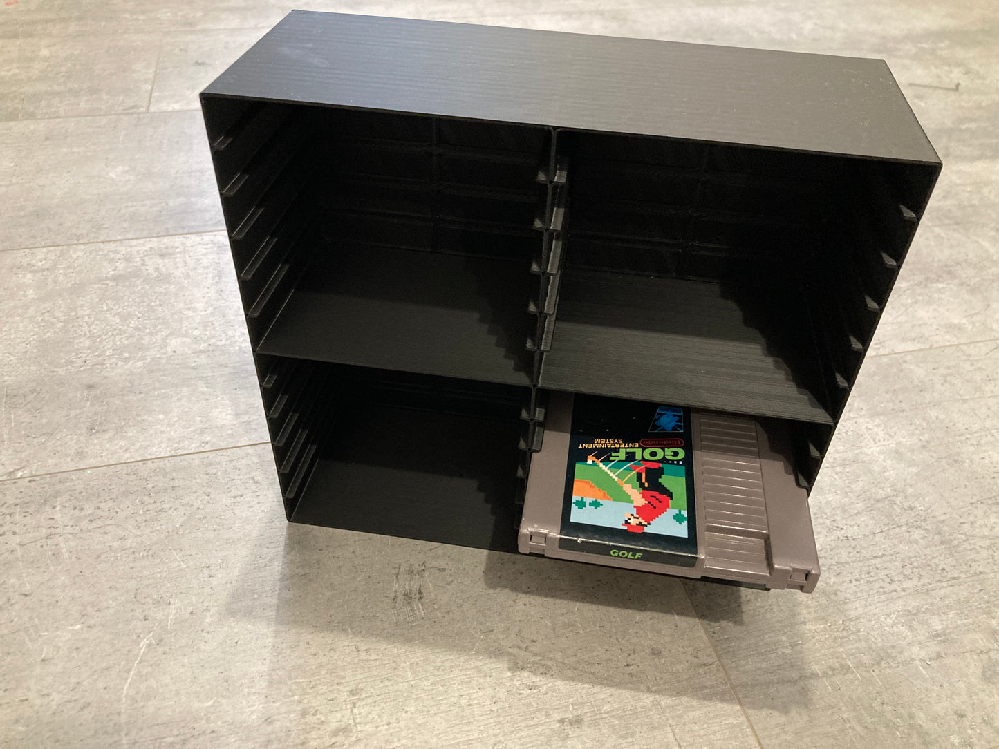 Rack display for 24 NES games without protectors